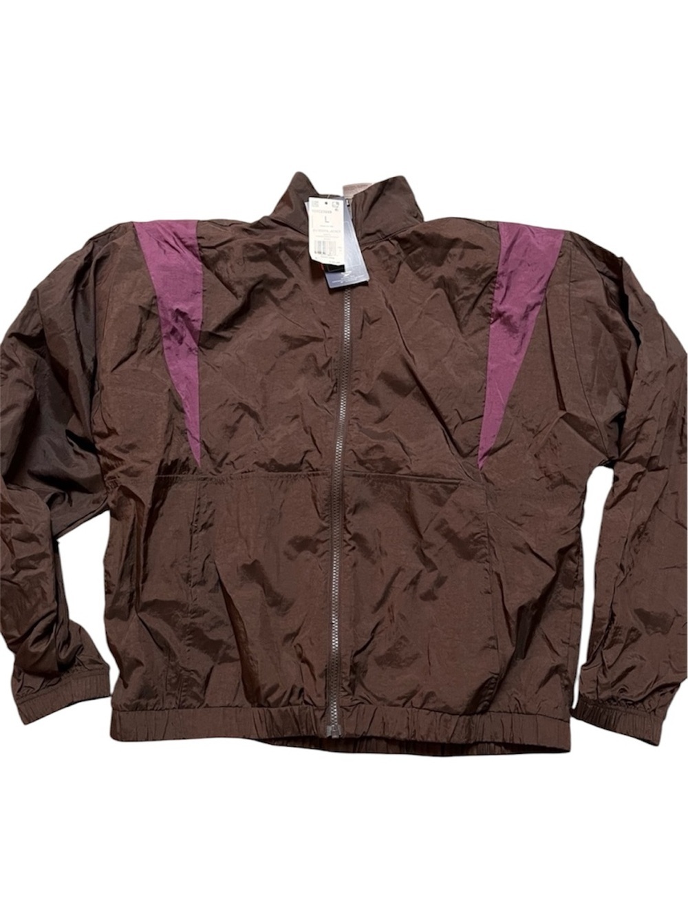 Reebok Brown Windbreaker Jacket with Purple Shoulder Panels
Large. New with tags